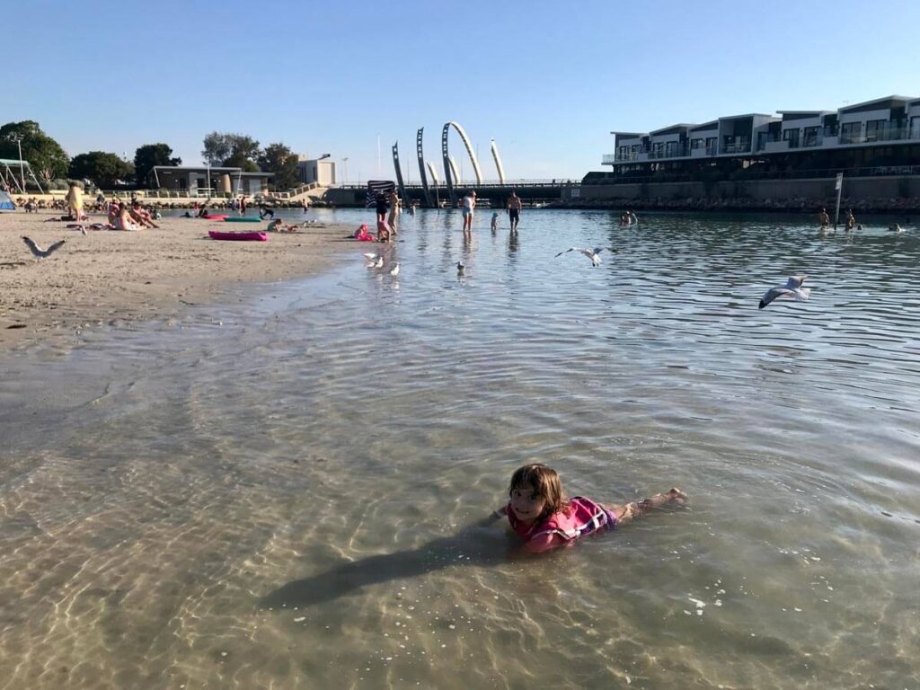 kid playing on ngarkai beach